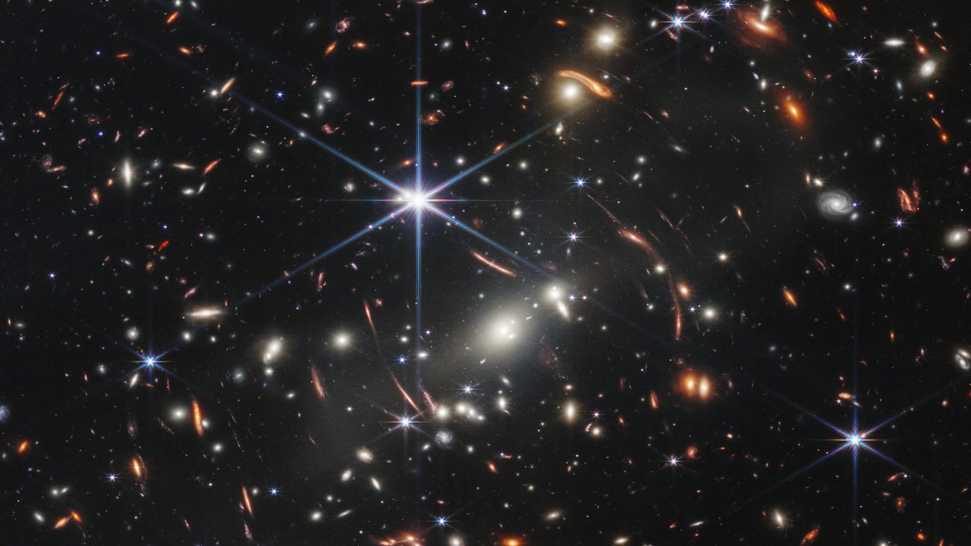 Offenbar lässt eine rätselhafte Dunkle Energie das Weltall mit seinen Galaxien immer schneller expandieren. (JWST/NASA/ESA/CSA)